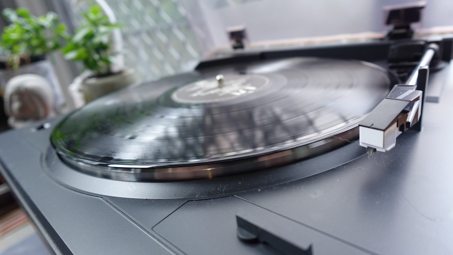 A vinyl record spinning on a turntable
